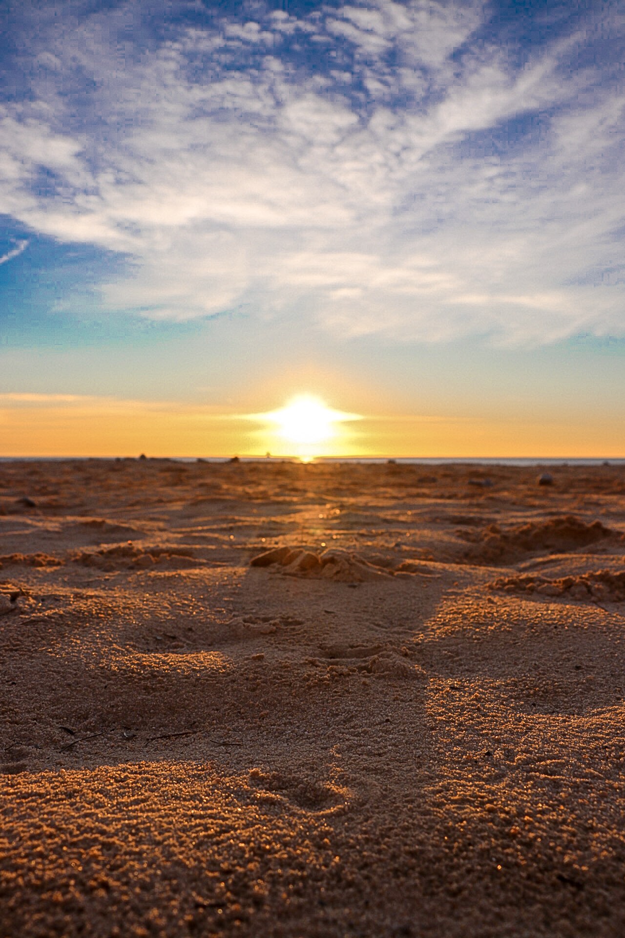 Levé de soleil sur le sable